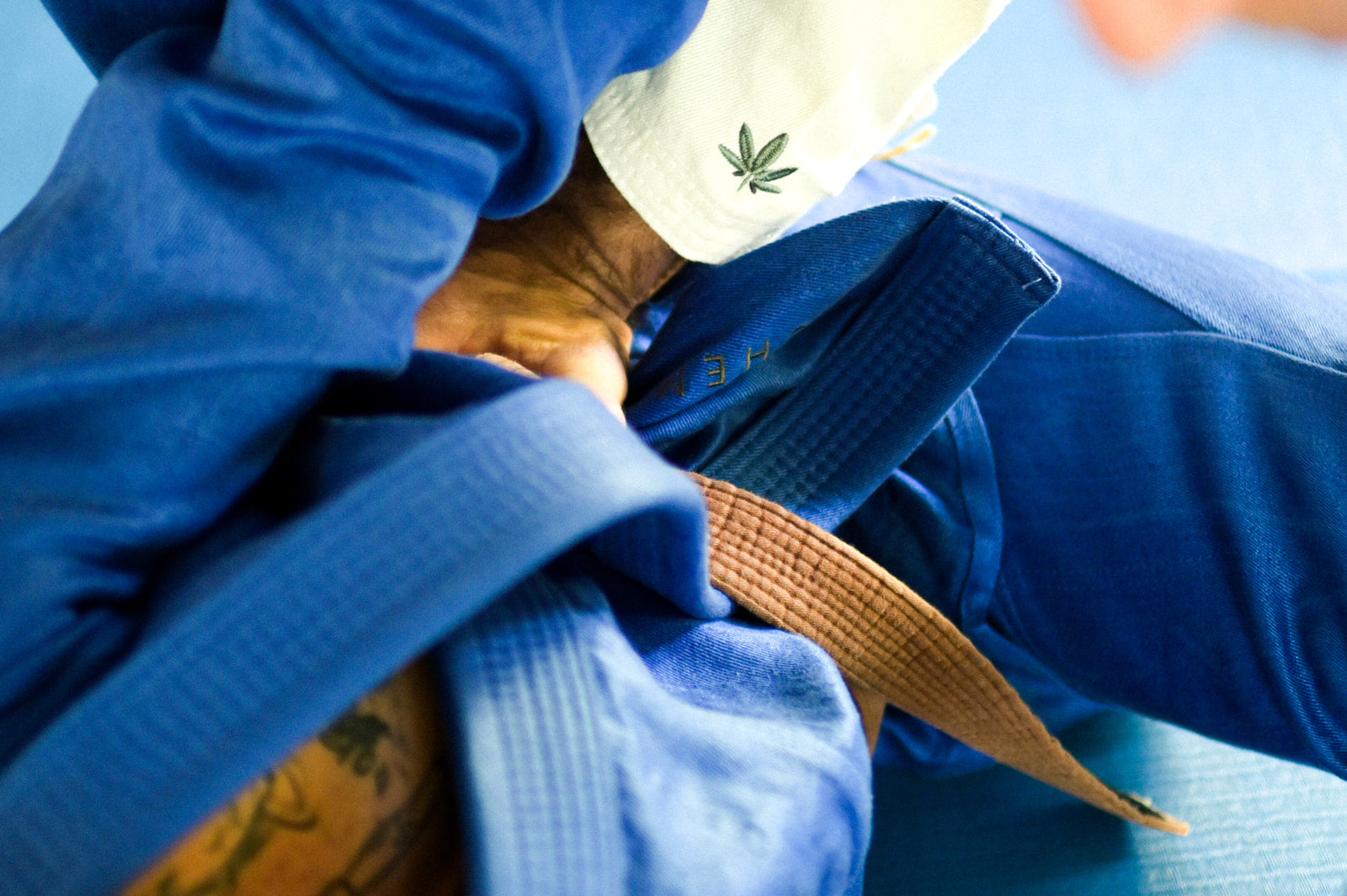 Men rolling wearing Alchemical Hemp Gi's