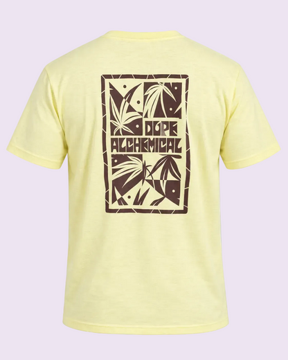 A pale yellow heathered short-sleeve t-shirt shown from the back, featuring a large dark brown graphic print with tropical leaves and the text &