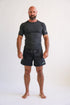 man wearing and black short sleeve hemp and organic cotton bjj rashguard